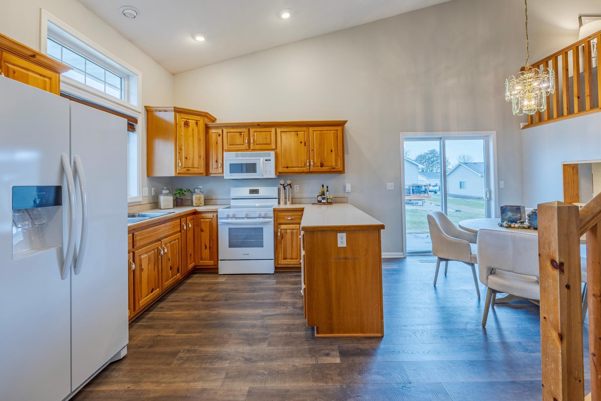 Main level entry, brand new flooring, appliances & paint