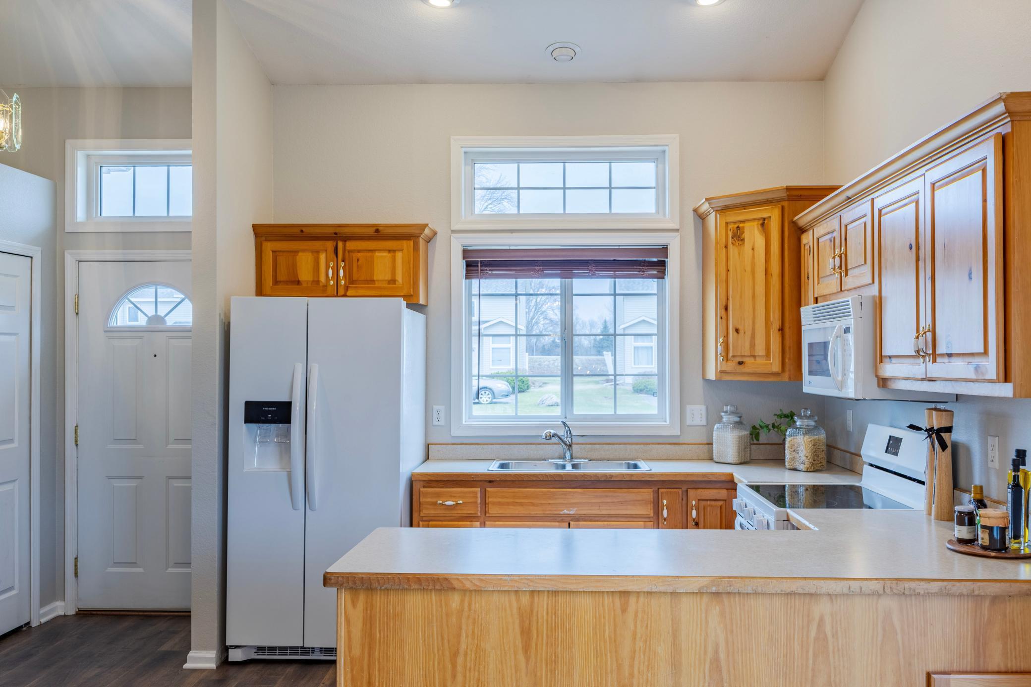 Front door and entry closet on left.