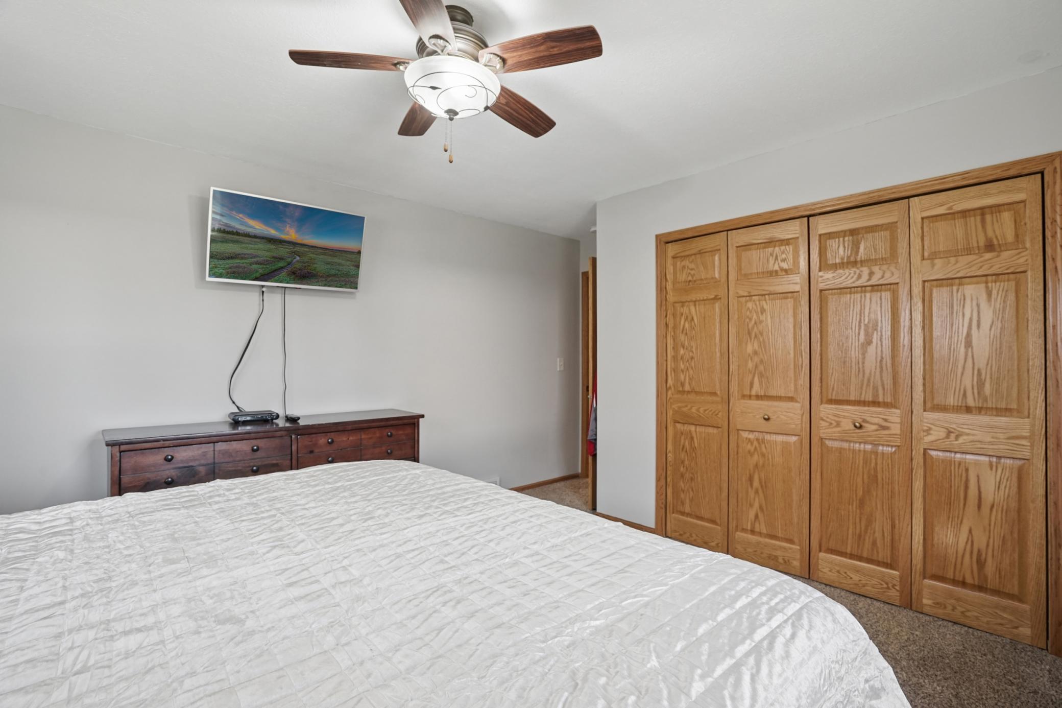 The main floor primary bedroom features a spacious closet.