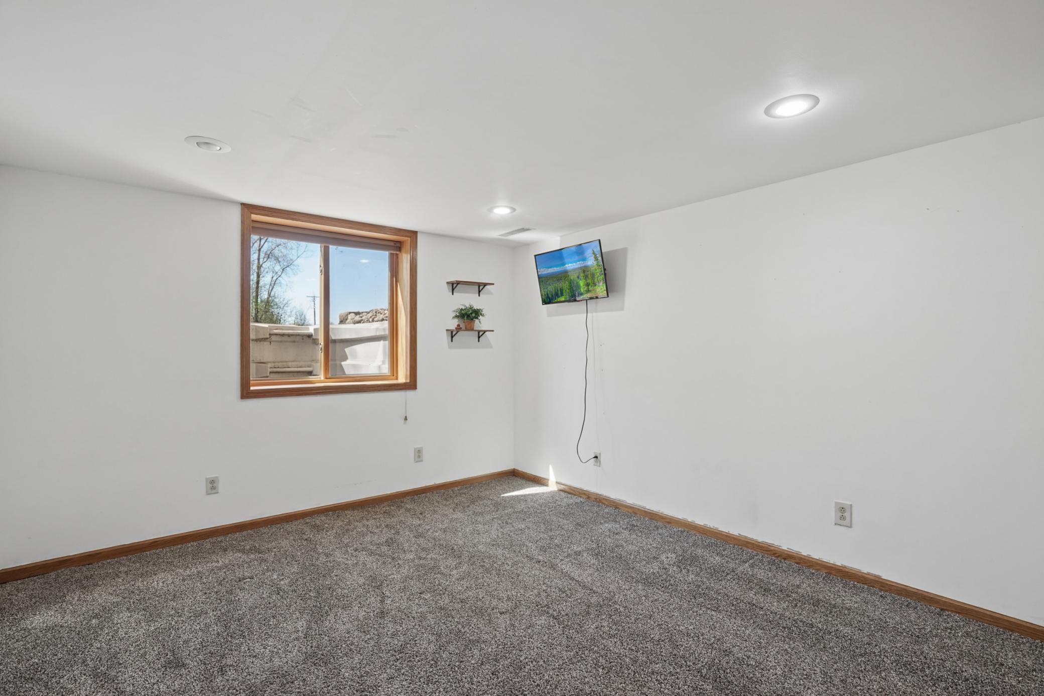 The fourth bedroom can be found in the basement.