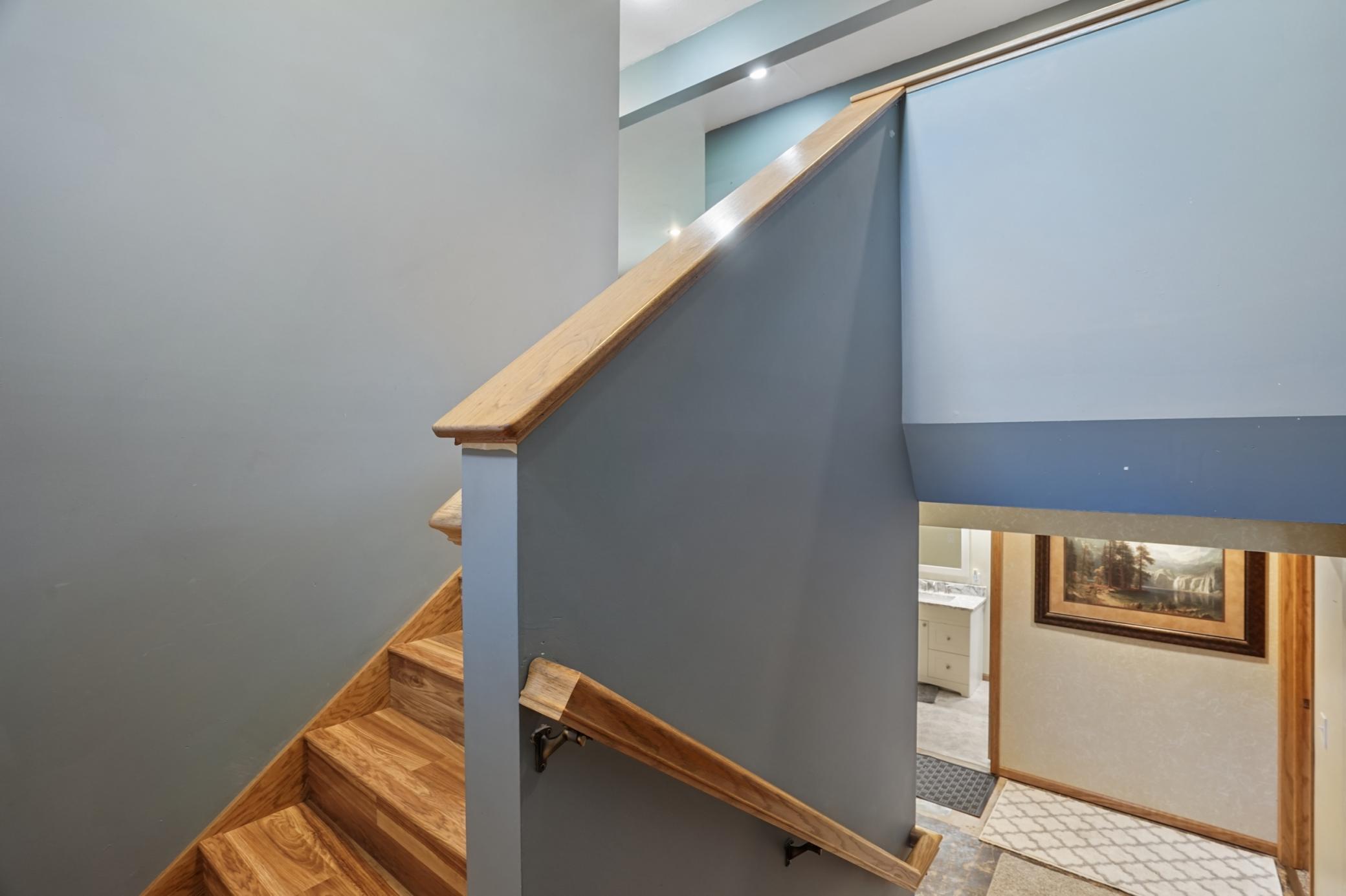 Head downstairs to see the large family room, two additional bedrooms, and a modern 3/4 bathroom.