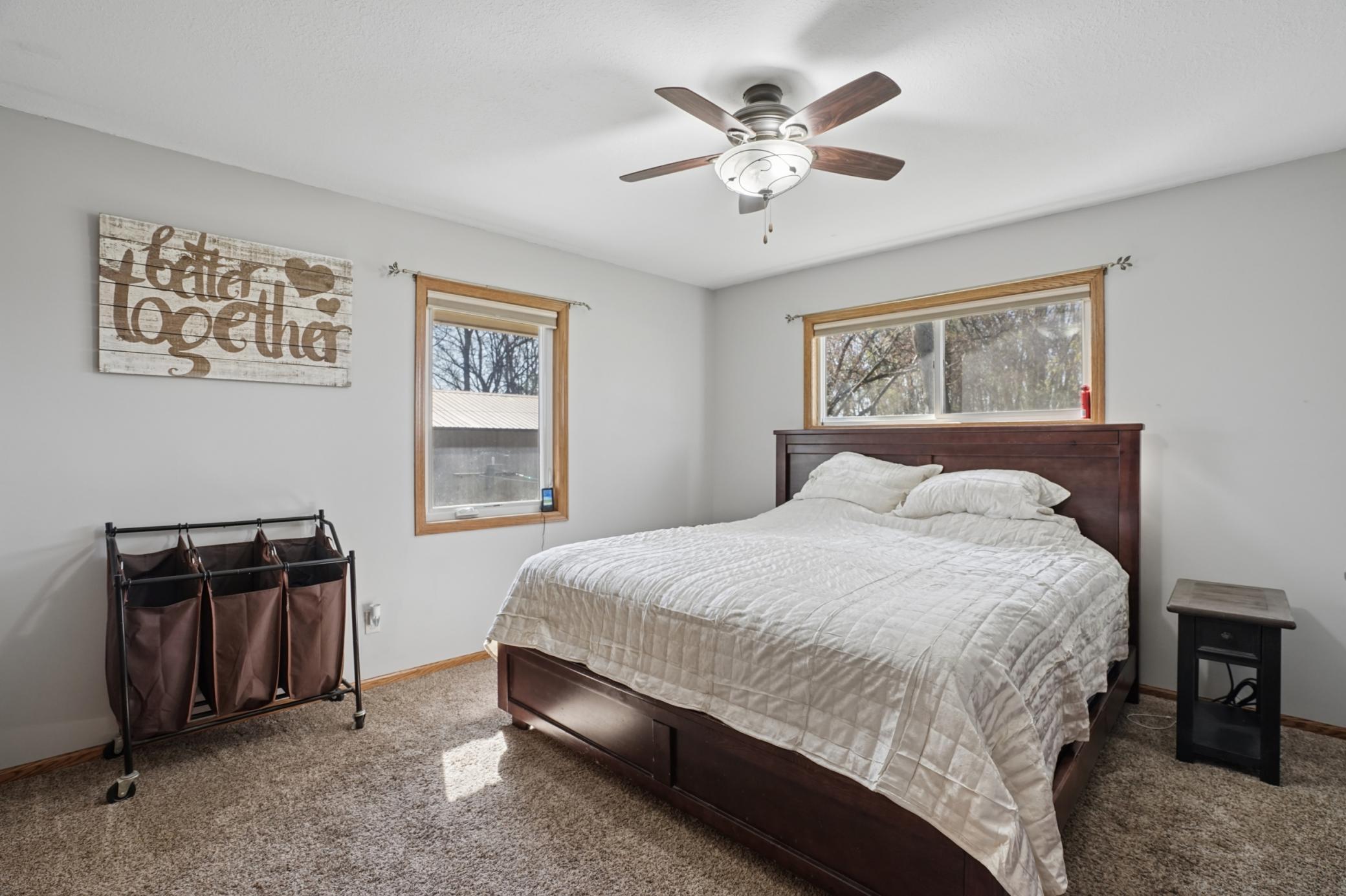The primary bedroom on the main floor features a large closet.