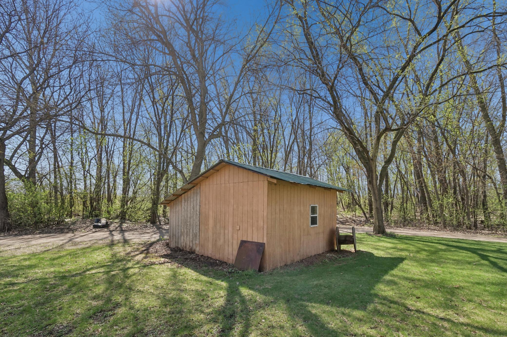 An additional storage shed is also included.