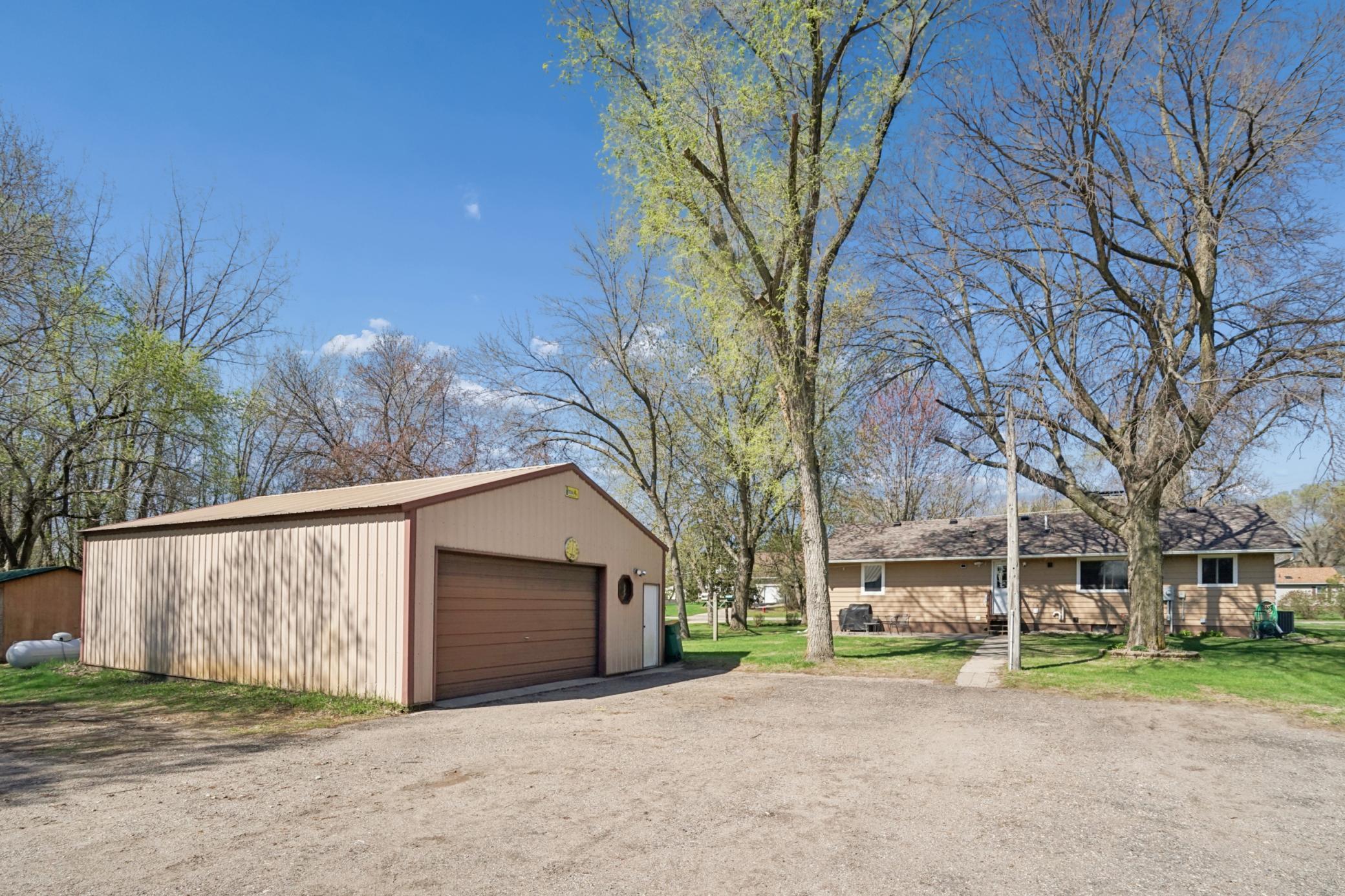 The detached 4 stall garage is heated.