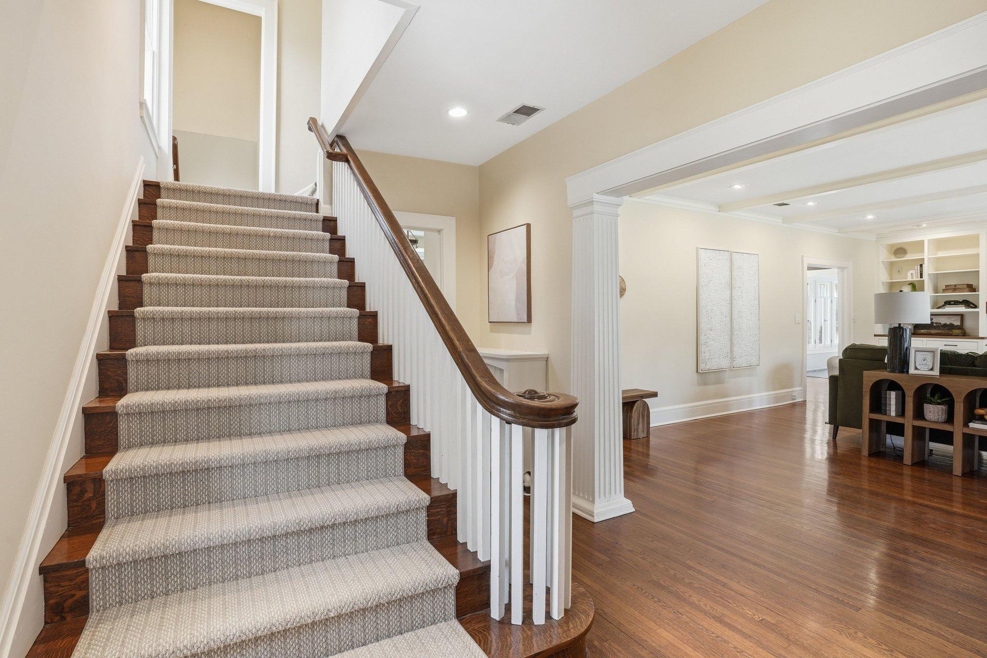 2200 Kenwood Parkway - view of sweeping staircase as you enter the home