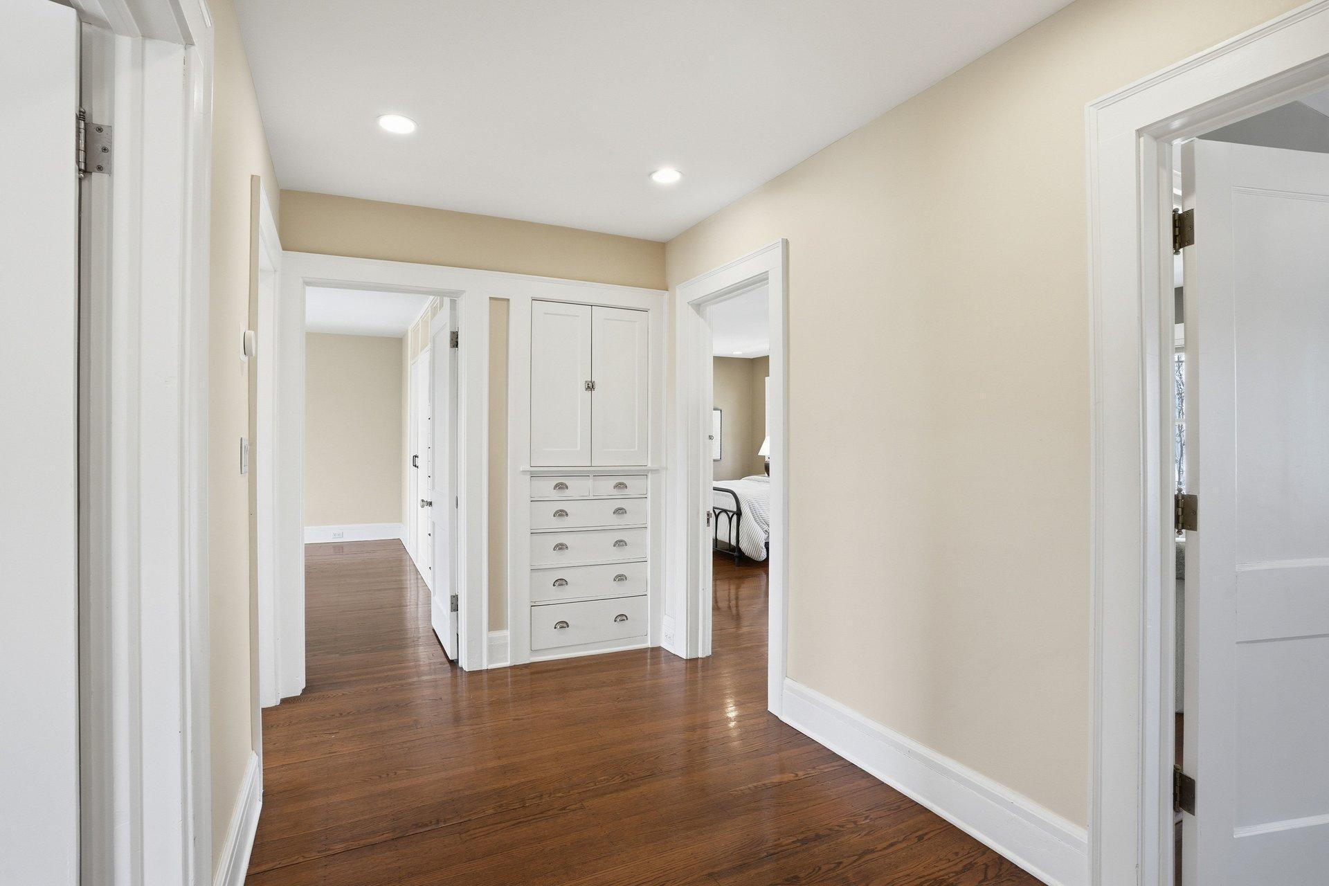 2200 Kenwood Parkway - Built-in upper level hall cabinetry is a great place for linens, blankets, etc.