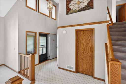 2 Story foyer provides great natural light and also has a second entrance to the garage down the hall.