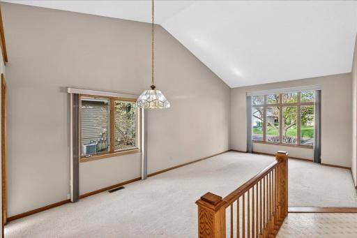Another view of the formal living room. The vaulted ceiling adds great height to the space!