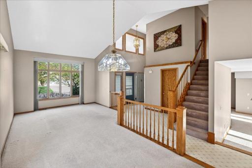 Formal living room and connected dining room.