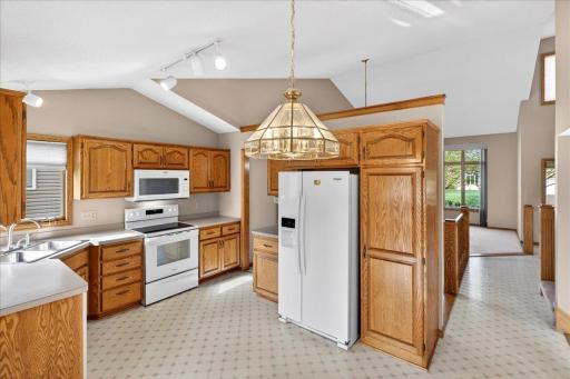 The spacious kitchen has plenty of cabinet space