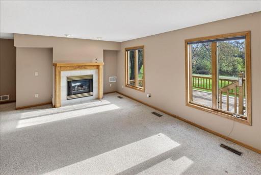 The family room is highlighted by a gas burning fireplace.
