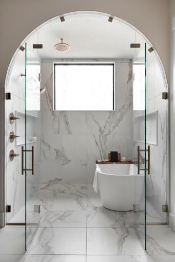 Primary Ensuite Bath Wet room - Shower & Soaking Tub with arched opening & glass doors; zero transition entry