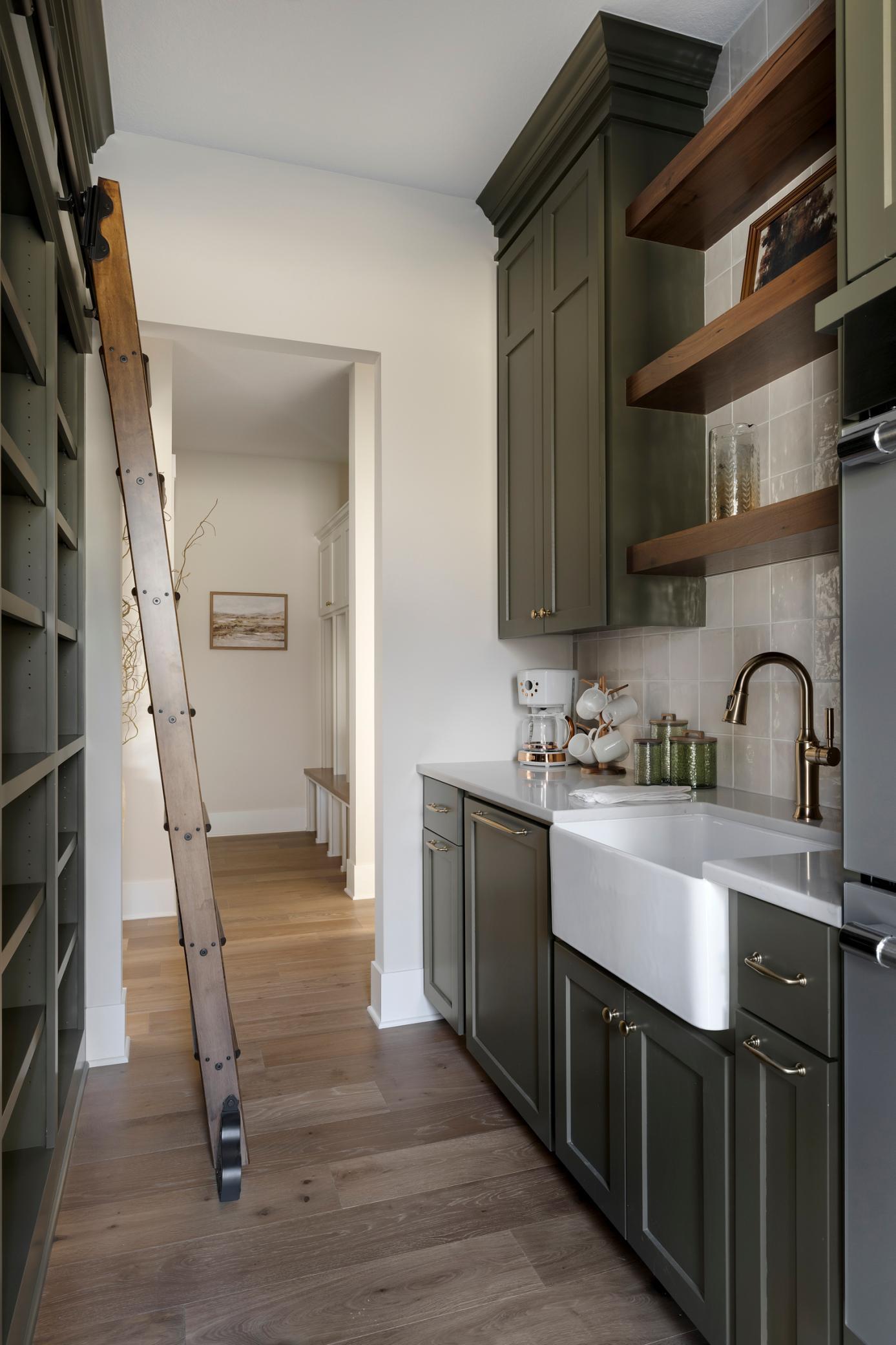 Pantry with cabinets & open shelving with Library Ladder