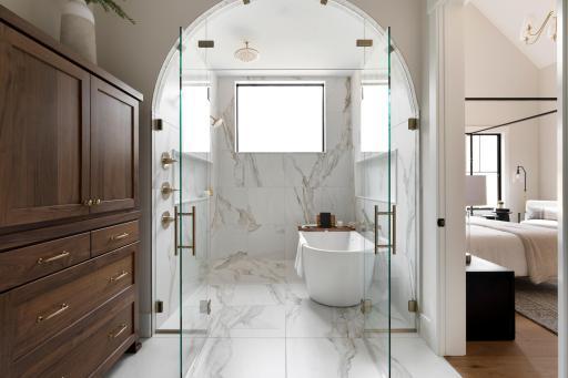 Primary Ensuite Bath/ Wet room - Shower & Soaking Tub with arched opening & glass doors