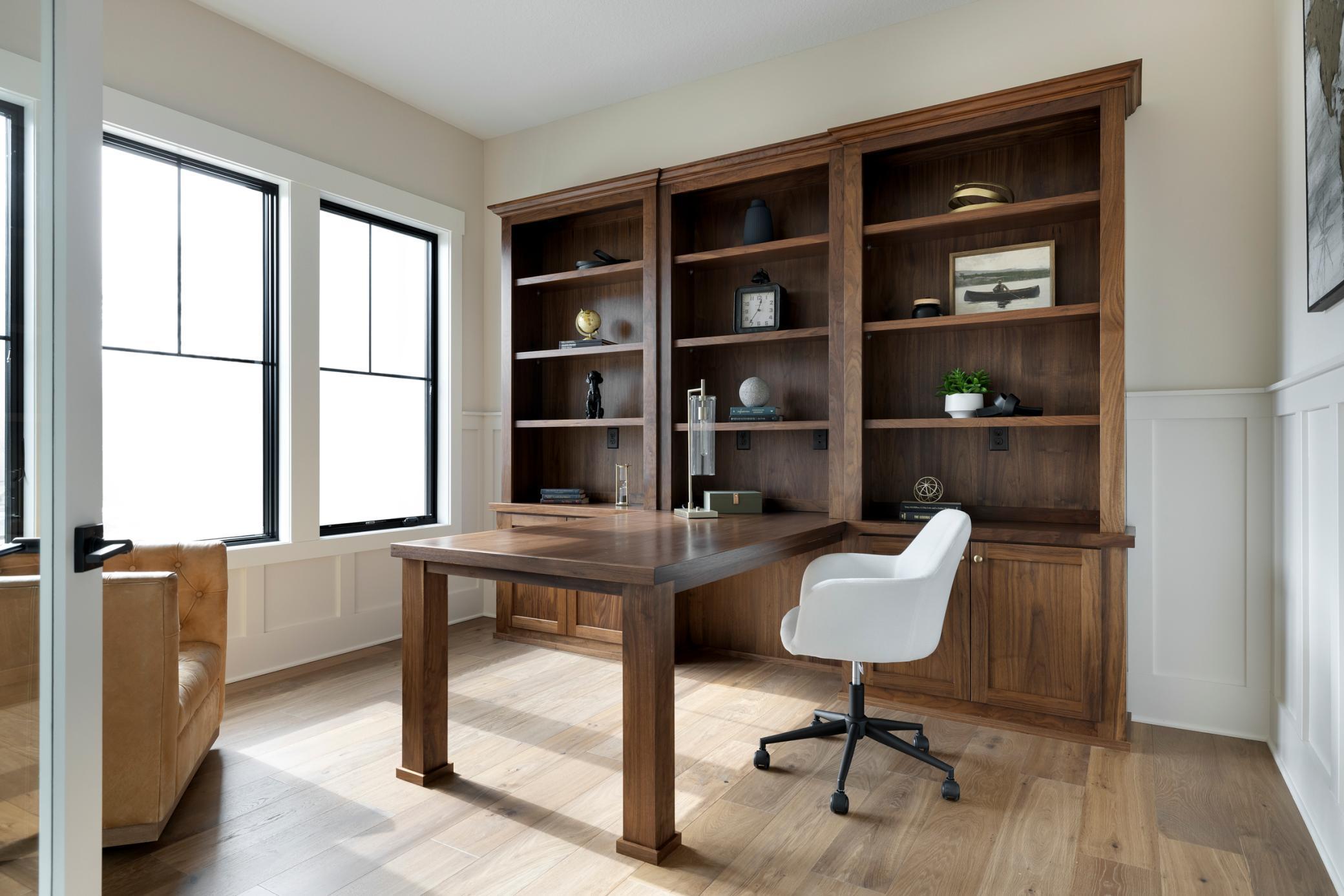 Den with built in walnut desk & book cases