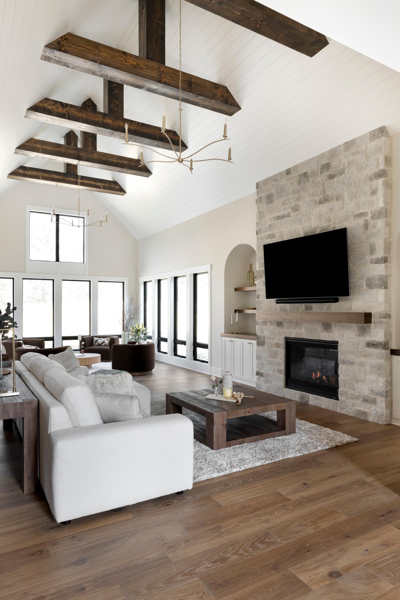 Great Room with High Ceilings, Wood beams & Chandeliers