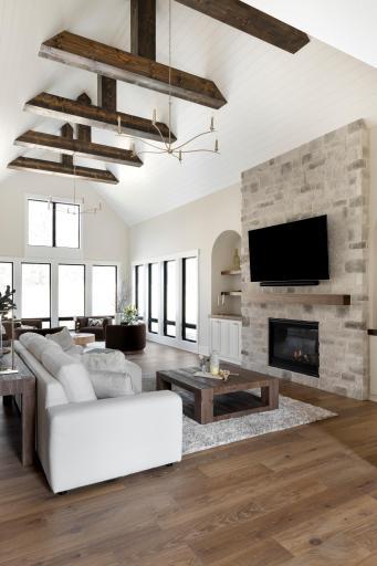 Great Room with High Ceilings, Wood beams & Chandeliers