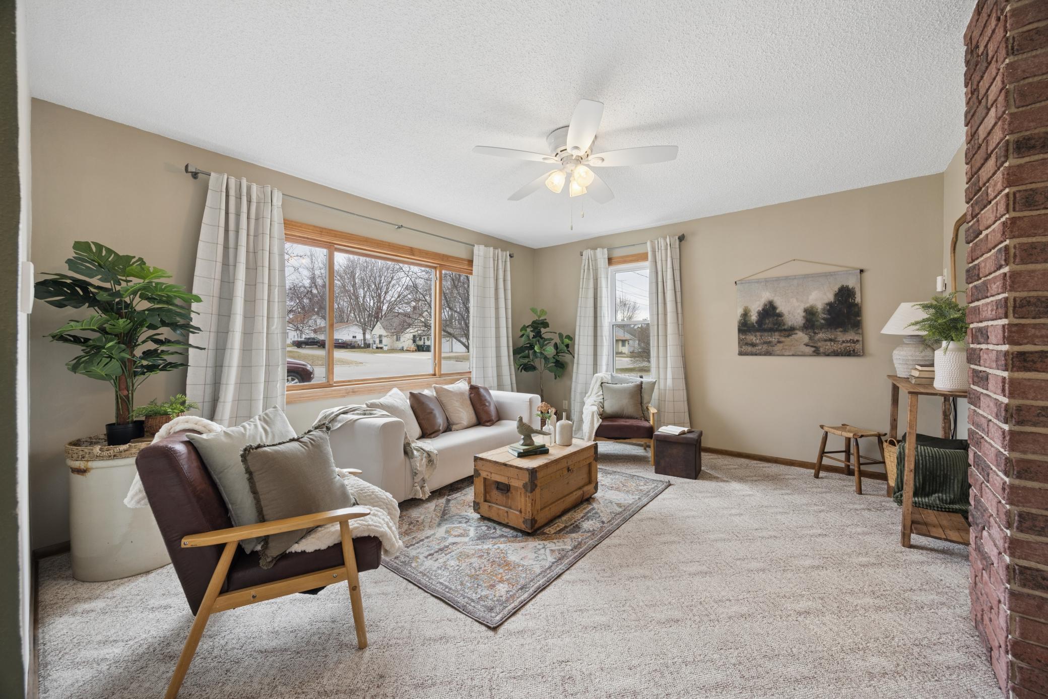 Living room. Look at the huge windows.