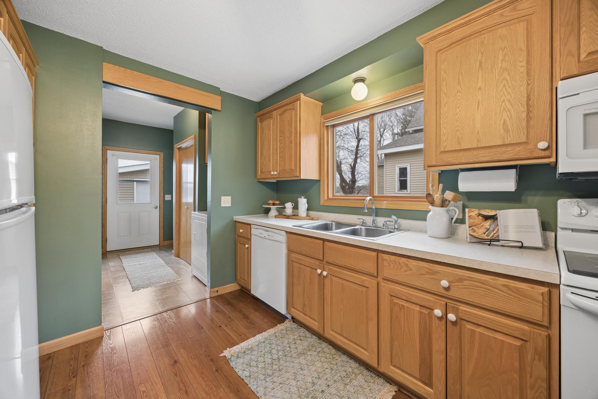 So much cupboard space. Plenty of natural sunlight coming in from the east-facing window.
