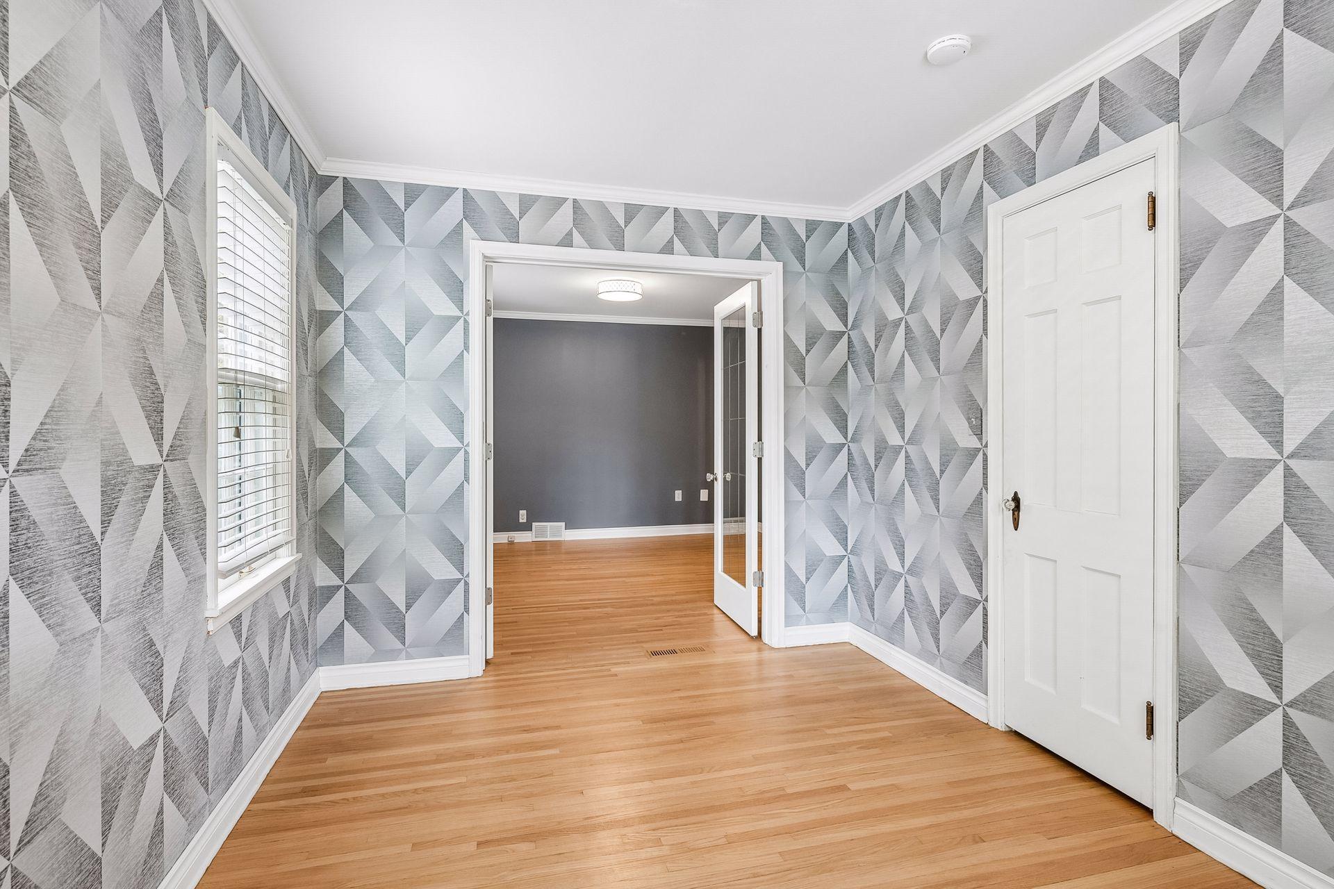 View from office/bonus room to main level bedroom