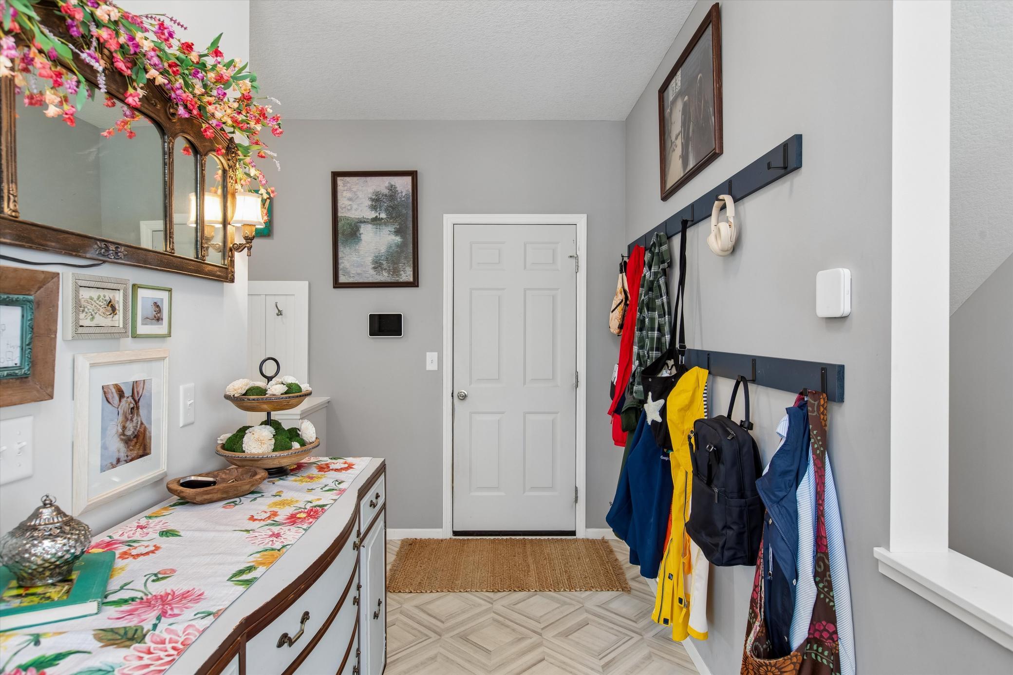Garage door nicely tucked in back of house