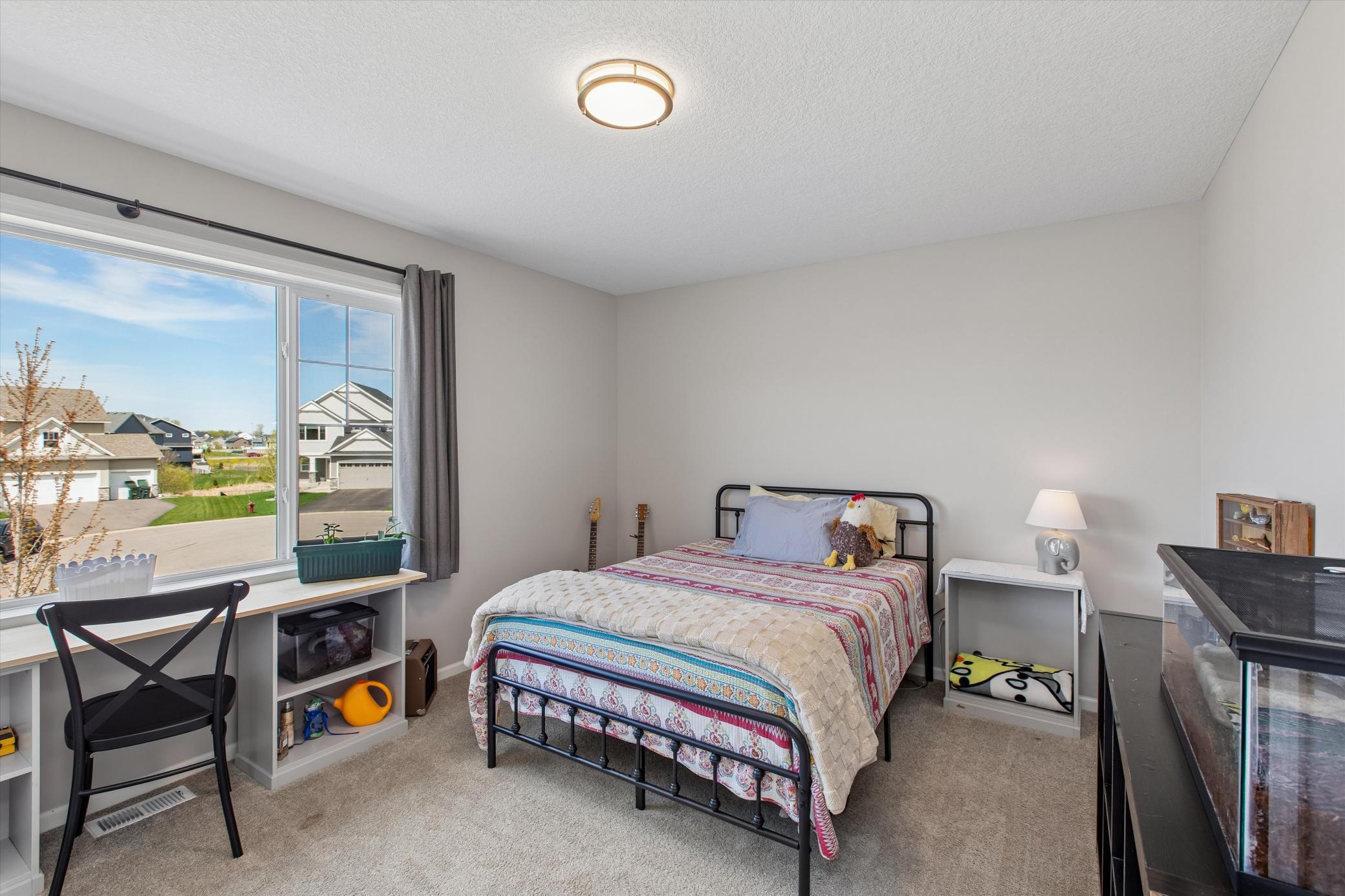 Upper level bedroom #3 with walk-in closet