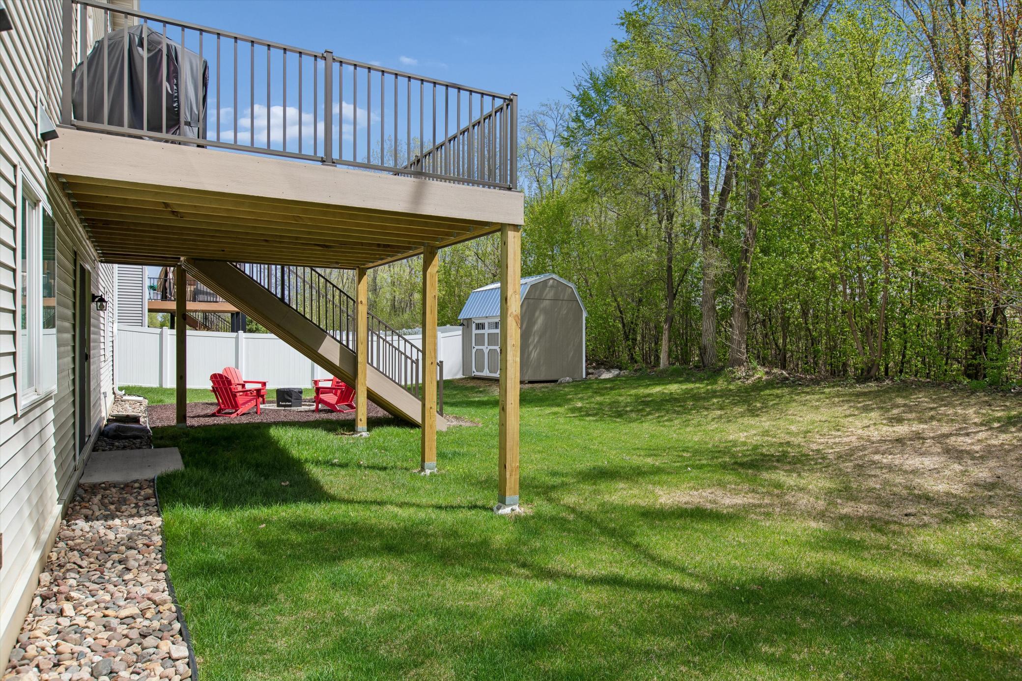 Private backyard with mature tree coverage