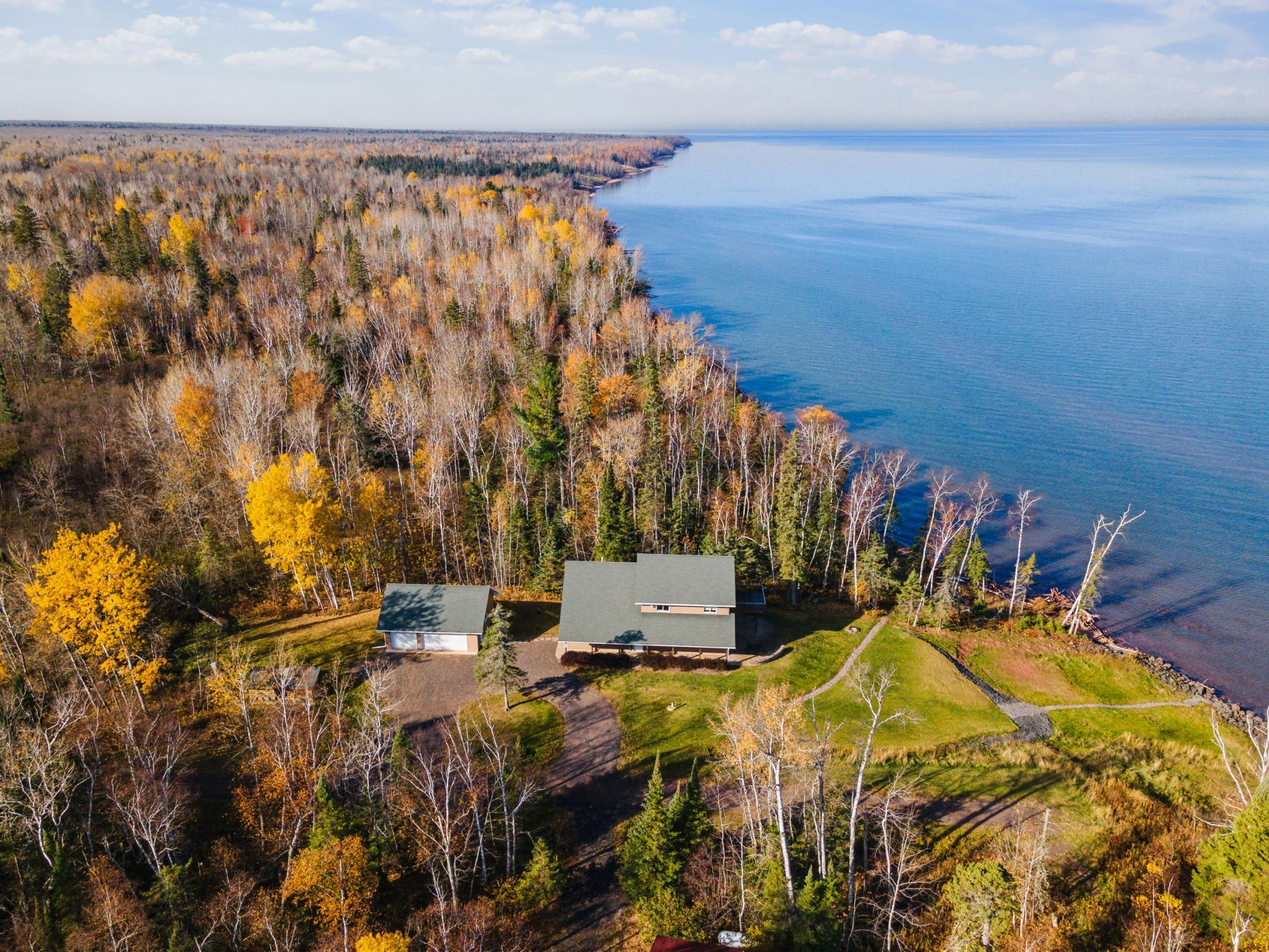 Fractional Ownership Lake Living Opportunity on Lake Superior! Own a share of this home with a fraction of the cost! Enjoy 5 weeks year round at this breathtaking 3 bed home on 150 feet of prime shoreline.