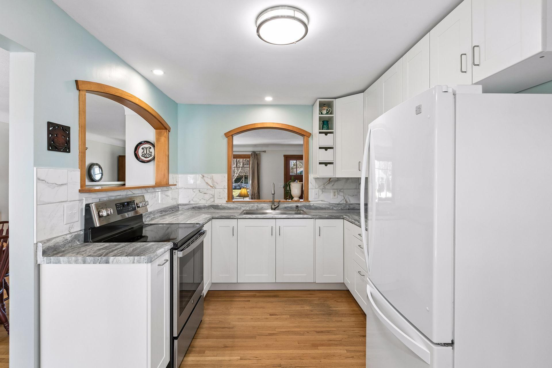 The kitchen is cheery and open, and is updated.