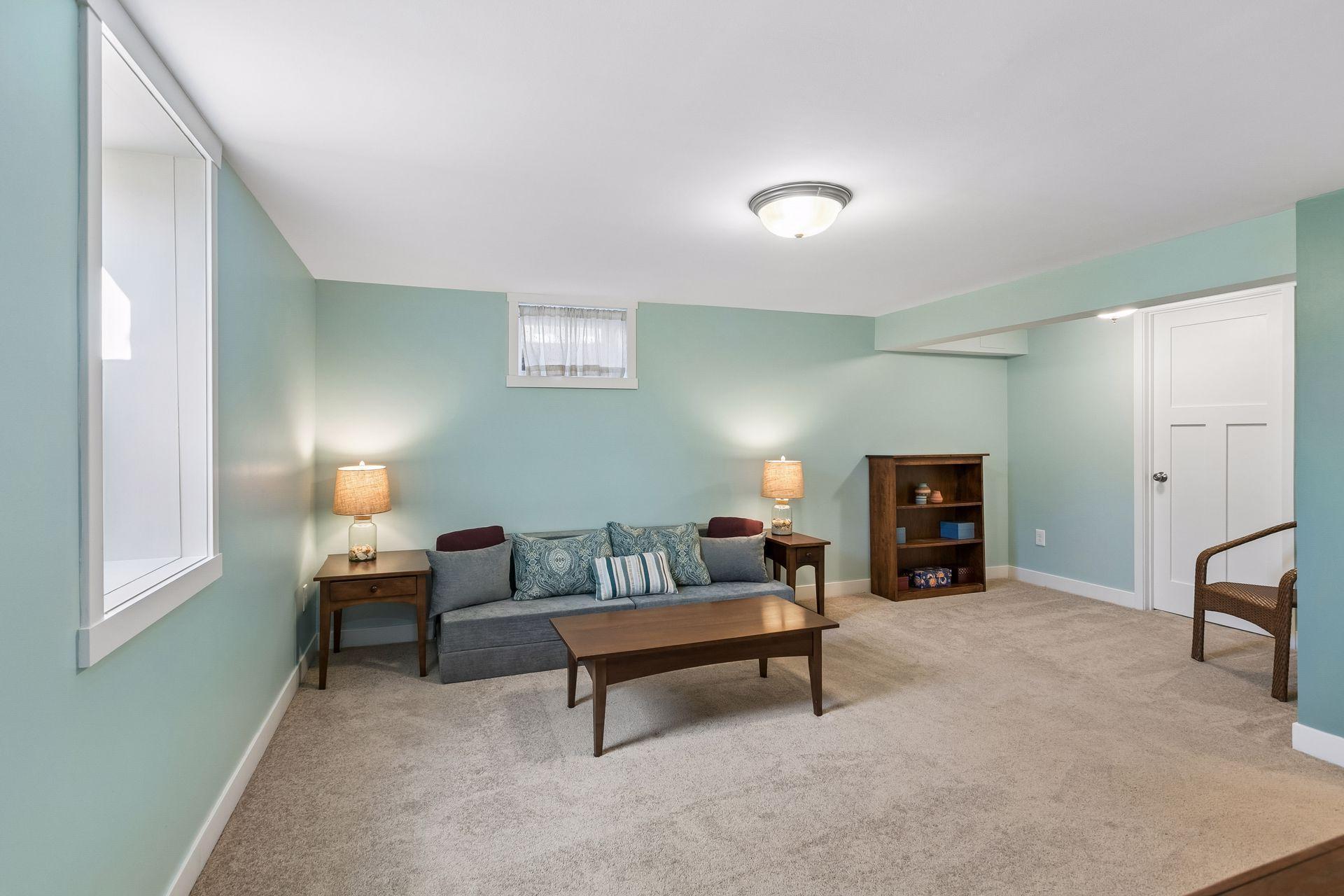 The third bedroom is located on the lower level.