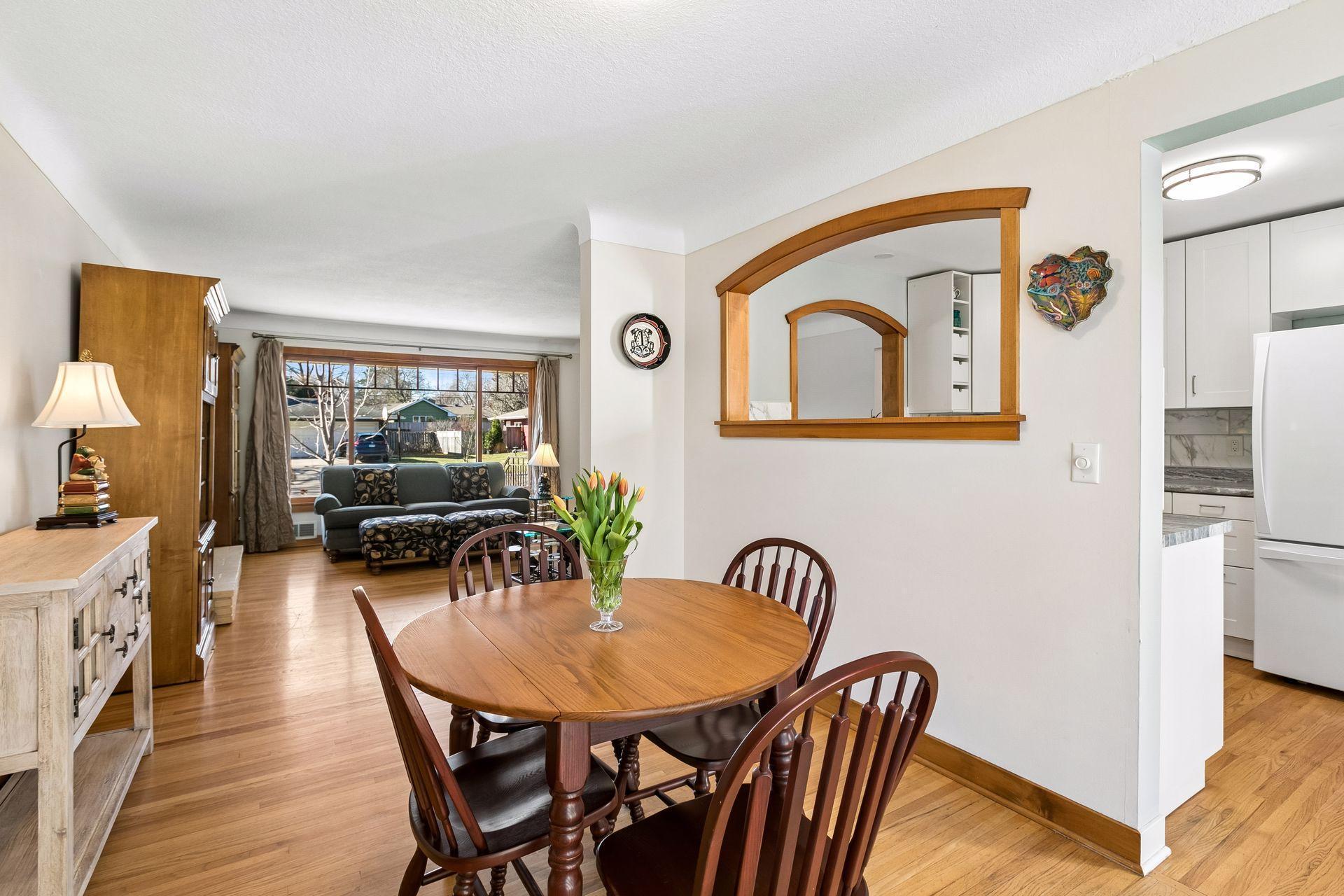 The kitchen has these unique niches edged with cherry trim to add a warm touch.