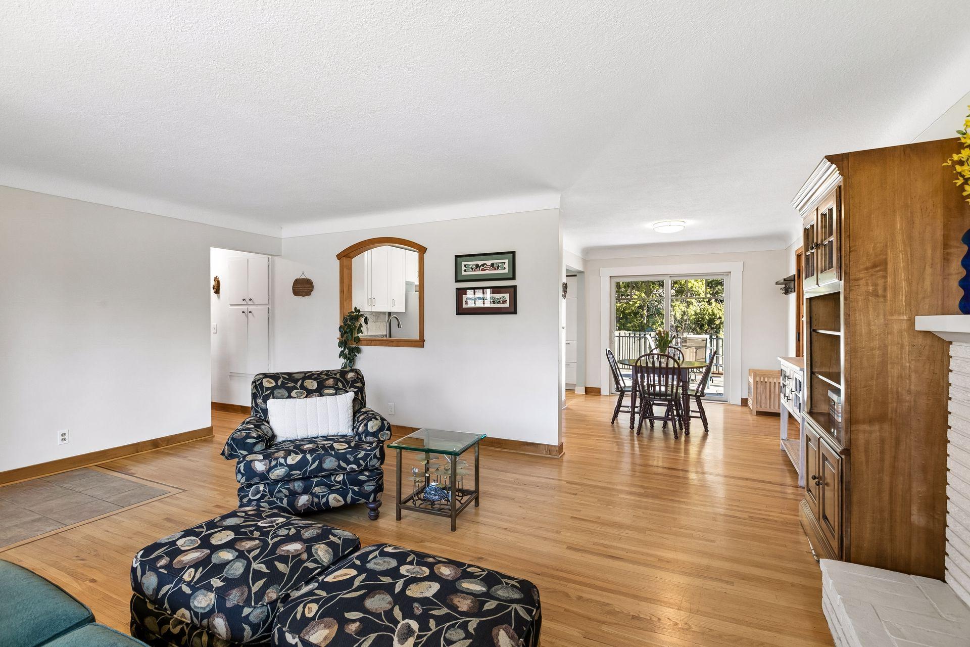 A view of the main floor showing off the kitchen and dining area.