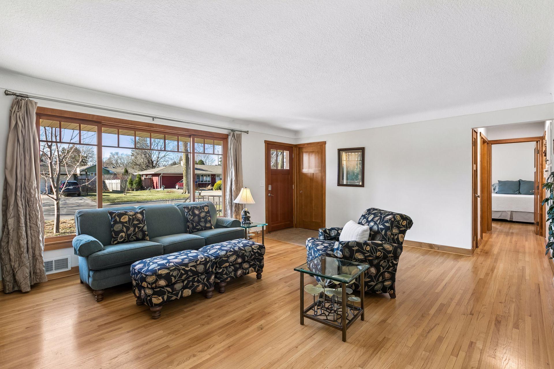 There is a handy coat closet and tiled entryway as well. It is a great space to greet guests.