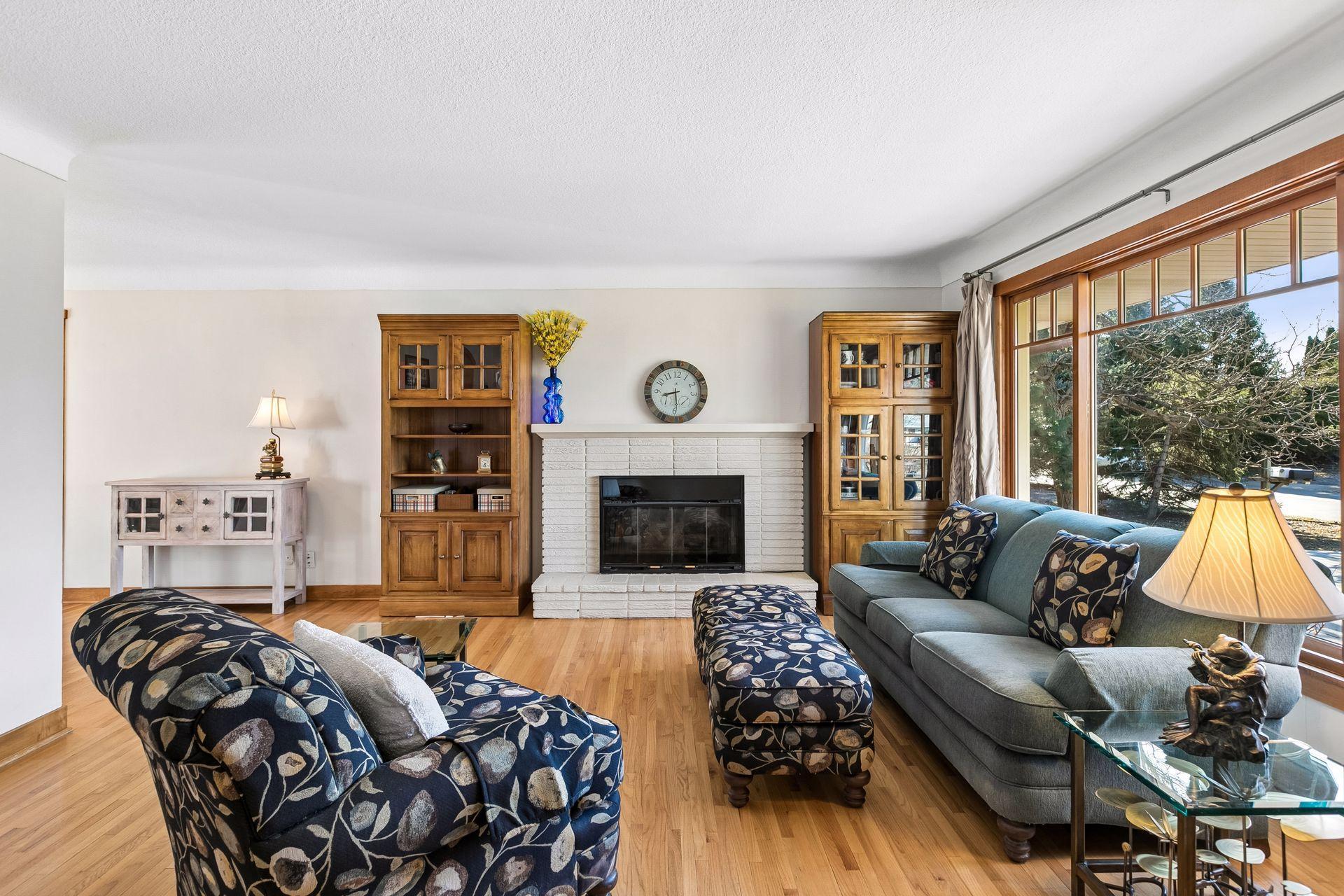 The focal point here is the brick fireplace ( never used by current seller).