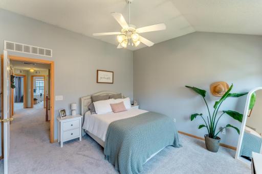 Primary bedroom with walk in closet and ensuite bath.