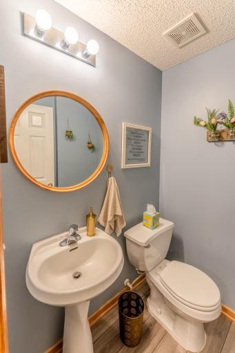 Half bath conveniently located on main level.