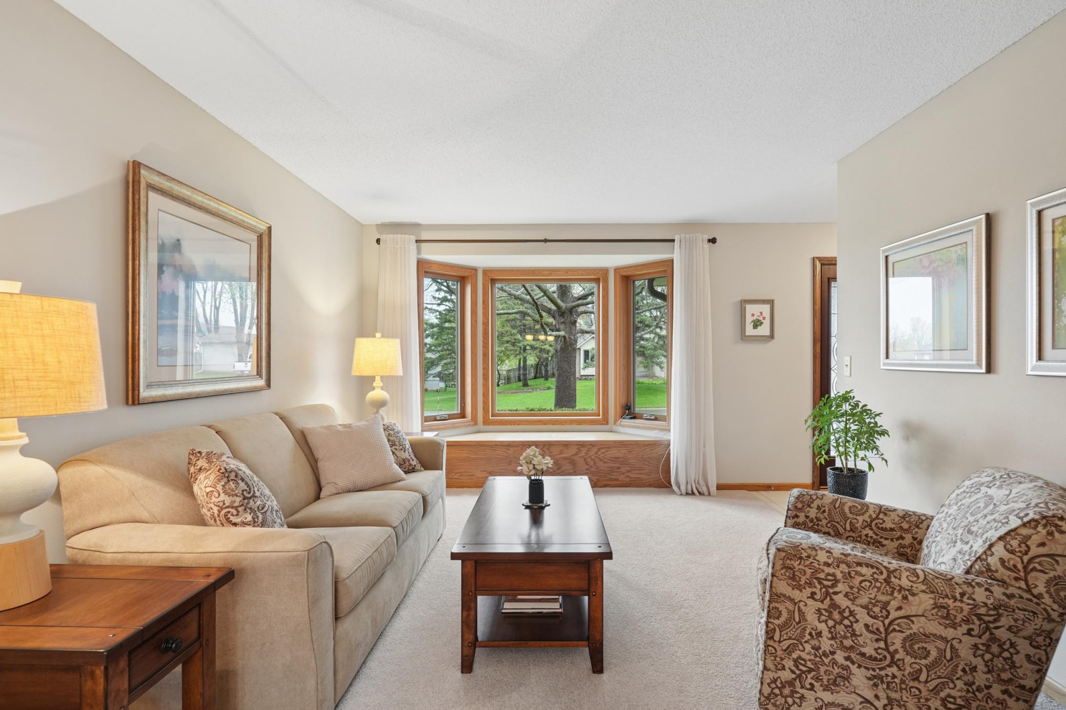 Living Room with Bay Window and sitting bench