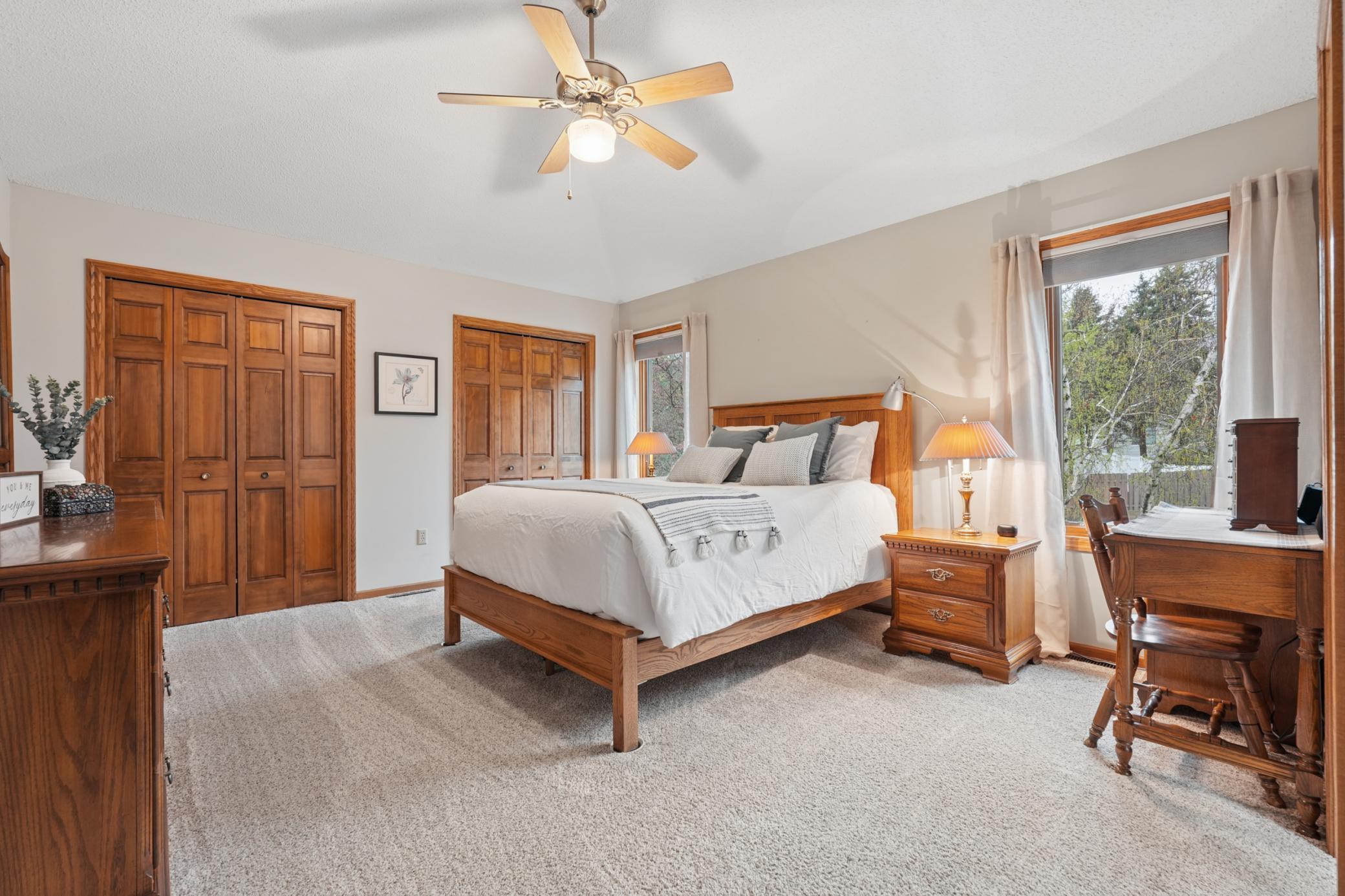 Primary Bedroom - Double Closets - Looks out onto the back yard