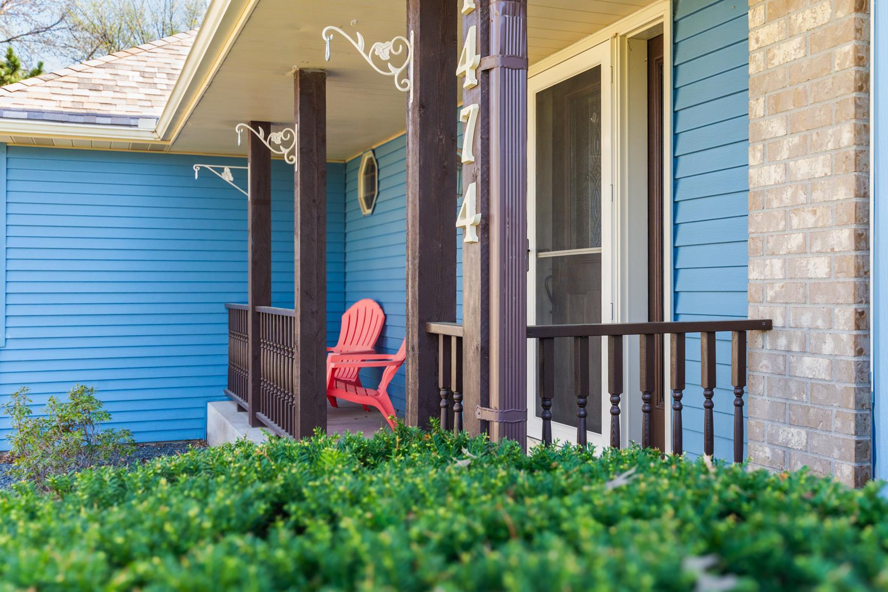 Enjoy the covered front porch, which had the pillars and spindles replaced in 2016.