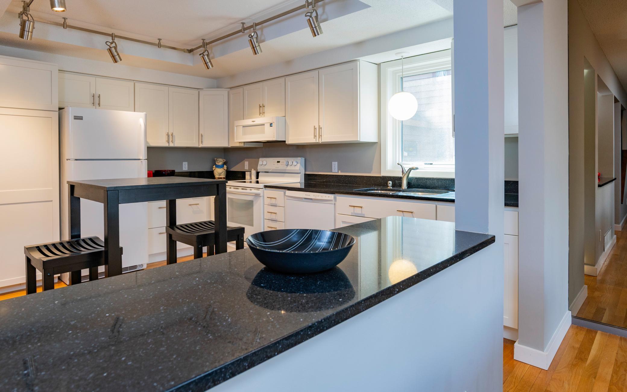 Serving counter pass through from kitchen to dining room.