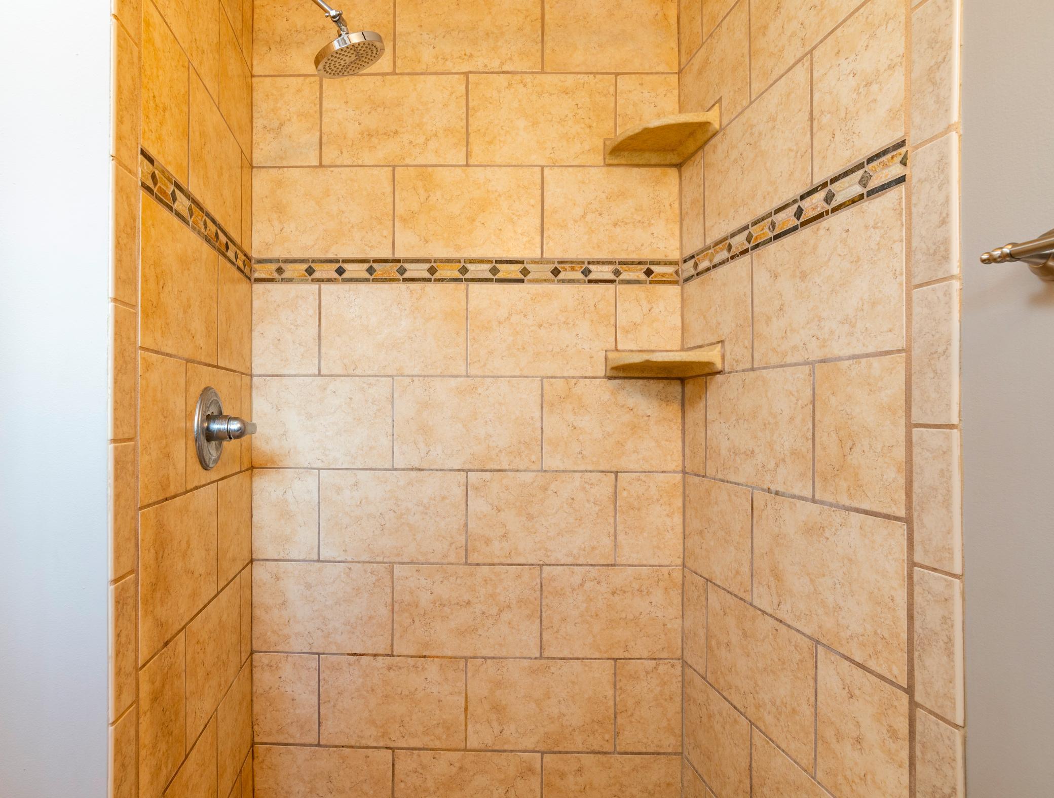 The primary bath walk-in shower.