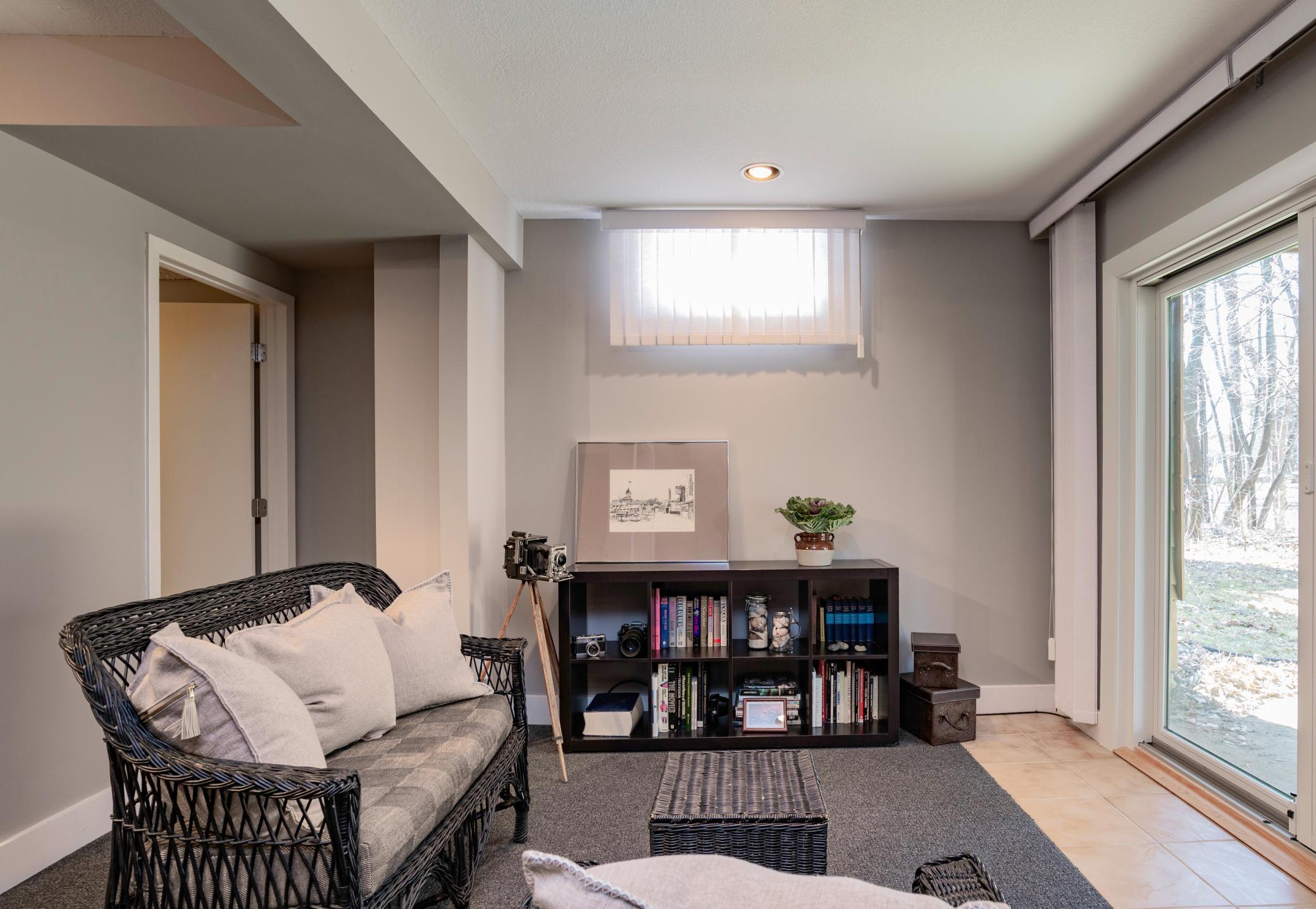 The lower level sitting area has access to the walk-out patio and backyard. This area could be made into a third Bedroom.