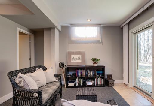 The lower level sitting area has access to the walk-out patio and backyard. This area could be made into a third Bedroom.