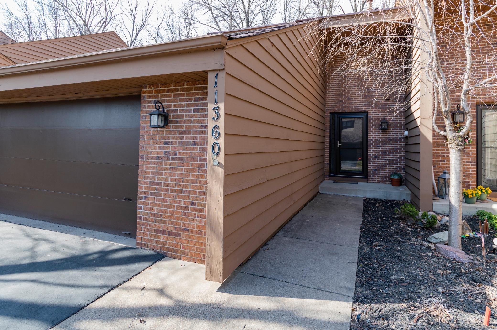 Another view of the front entry of 11360 36th Pl N.