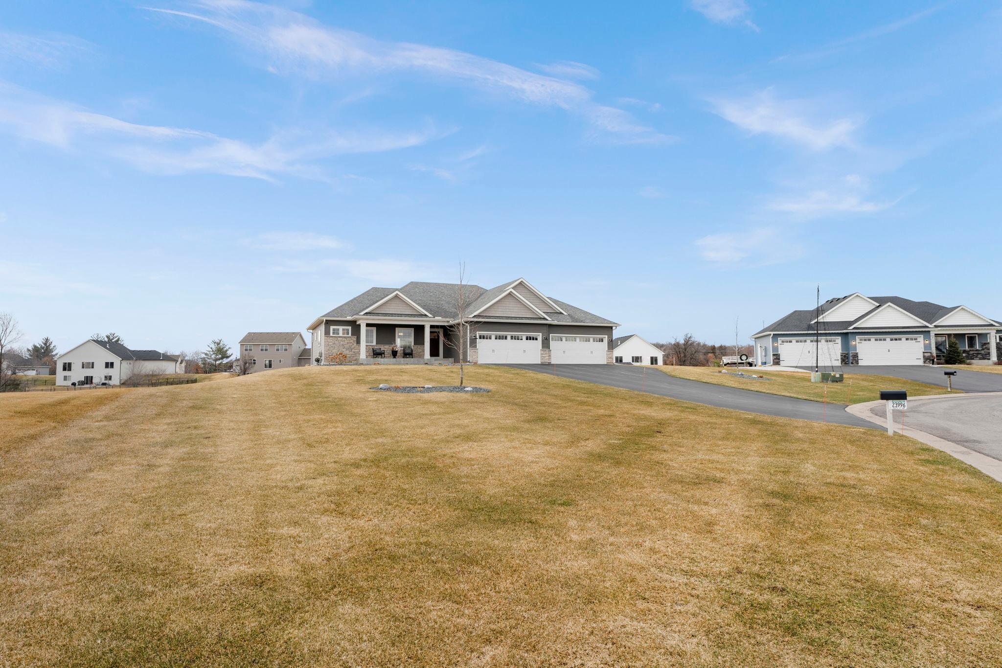 Perched up on the hill with long views from you oversized front porch.