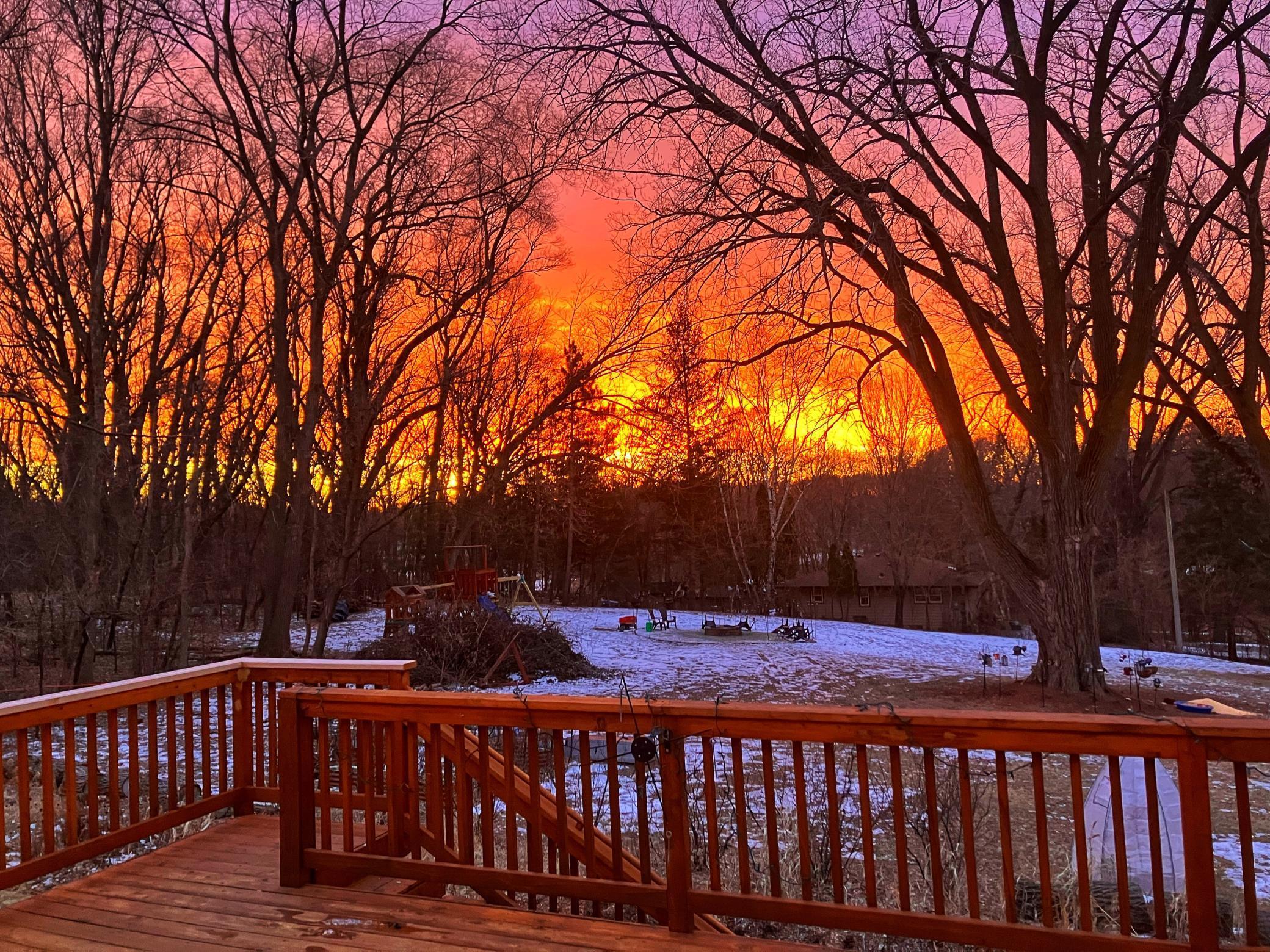 A golden sunset backdrop from the deck
