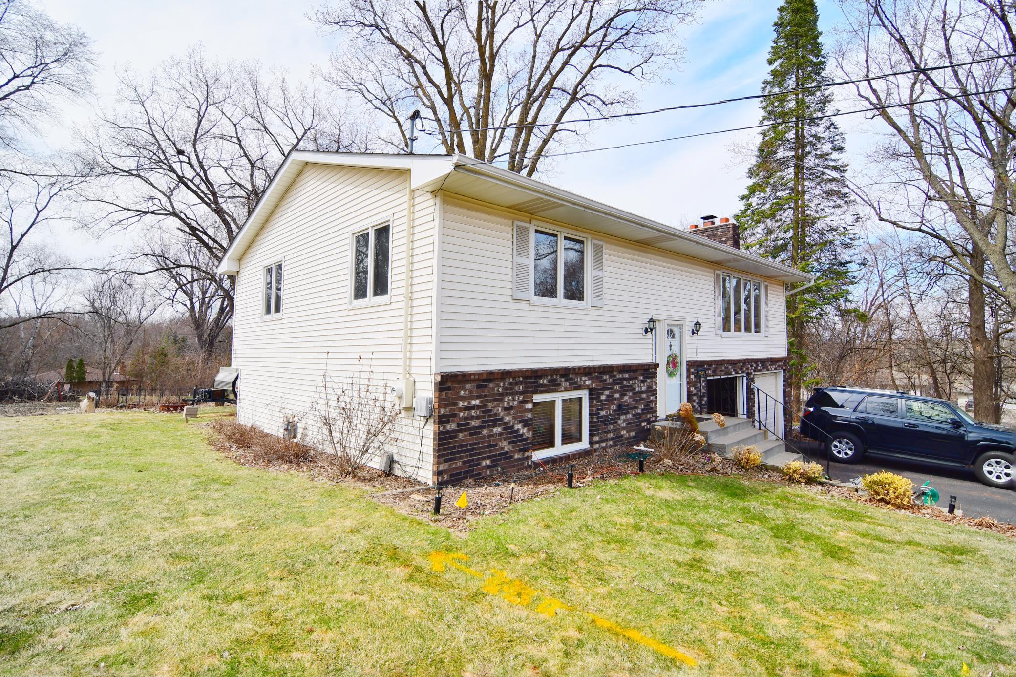 Front brick exterior and chimney adds a nice contrast to the light hue of the house.