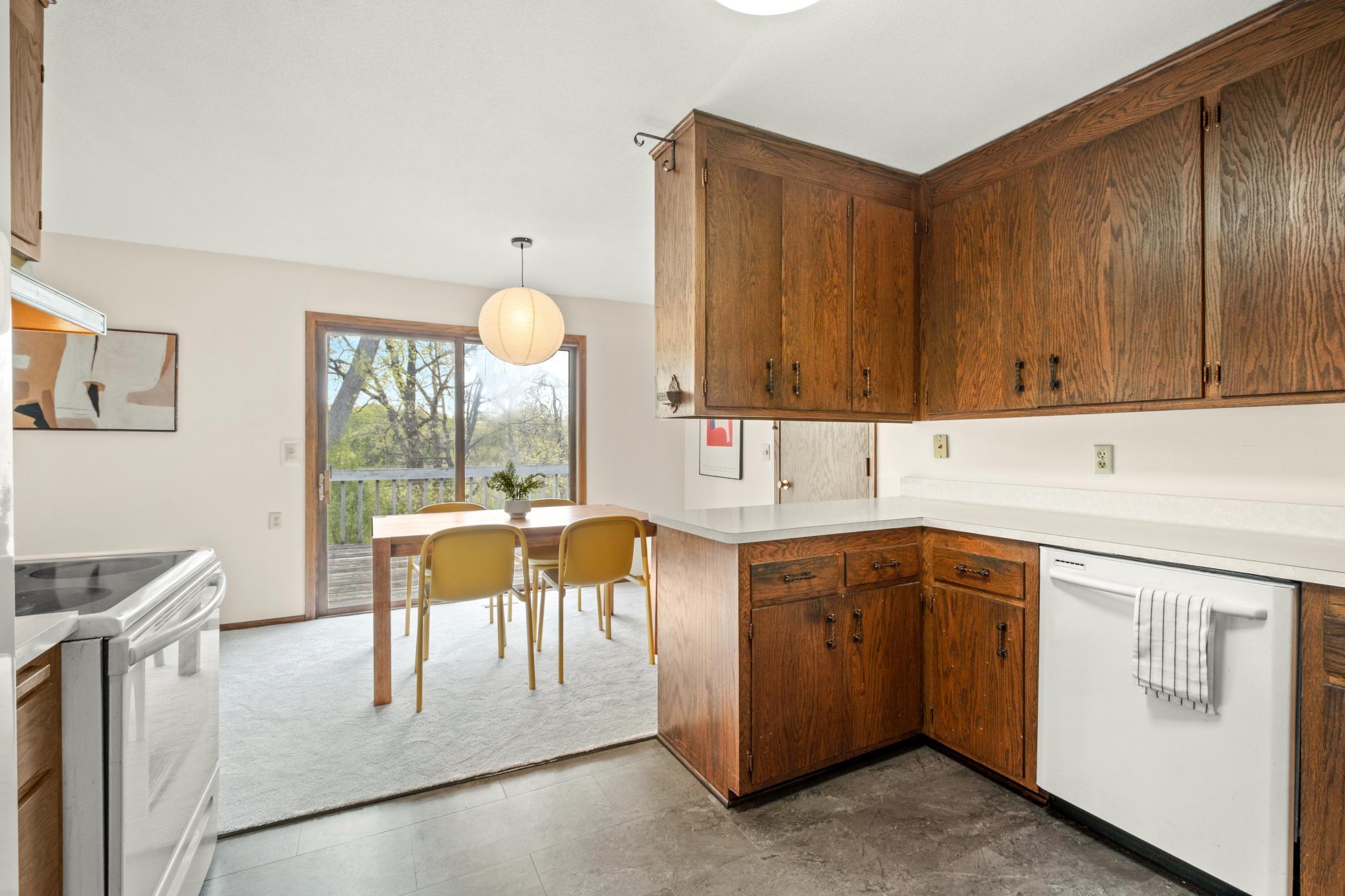Kitchen Looking out to dining area and deck