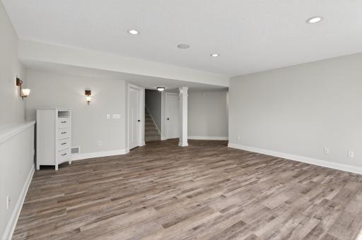 Whether you envision a high-end home theater, a premier game room, or a massive family lounge, this bright and airy space is designed to be the go-to destination for hosting and relaxation