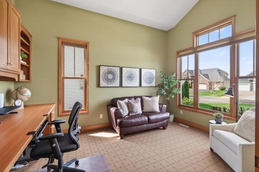 Executive suite or cozy den; this flexible sanctuary features soaring vaulted ceilings and expansive views, a bright, airy layout for work or relaxation